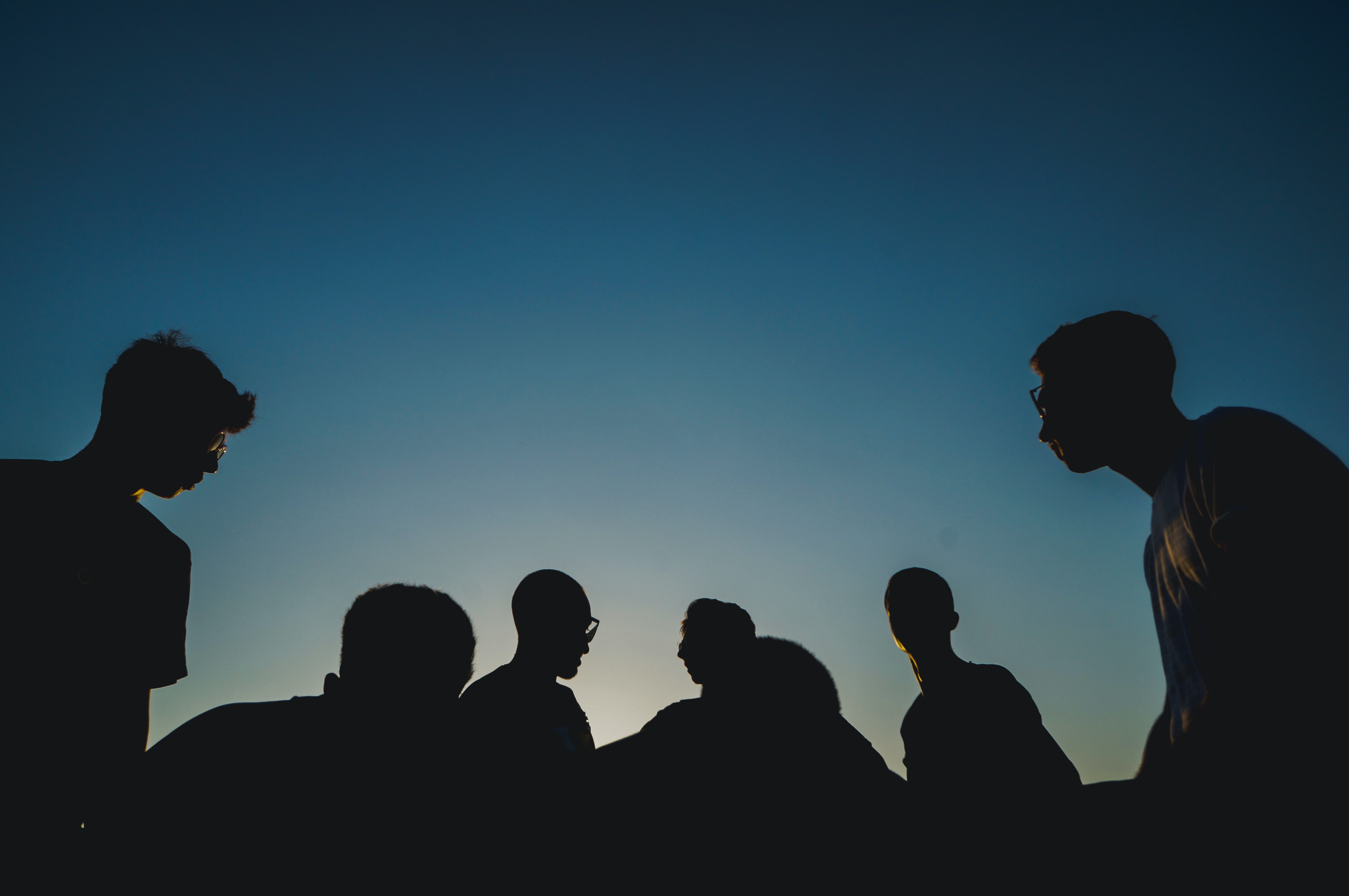 Silhouette of 7 people